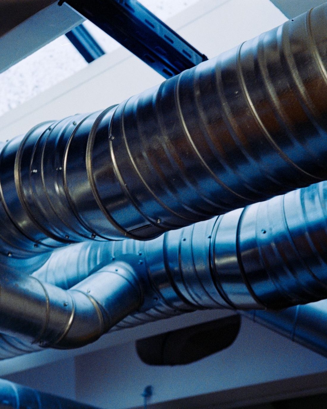 A close-up of a modern industrial ventilation duct system