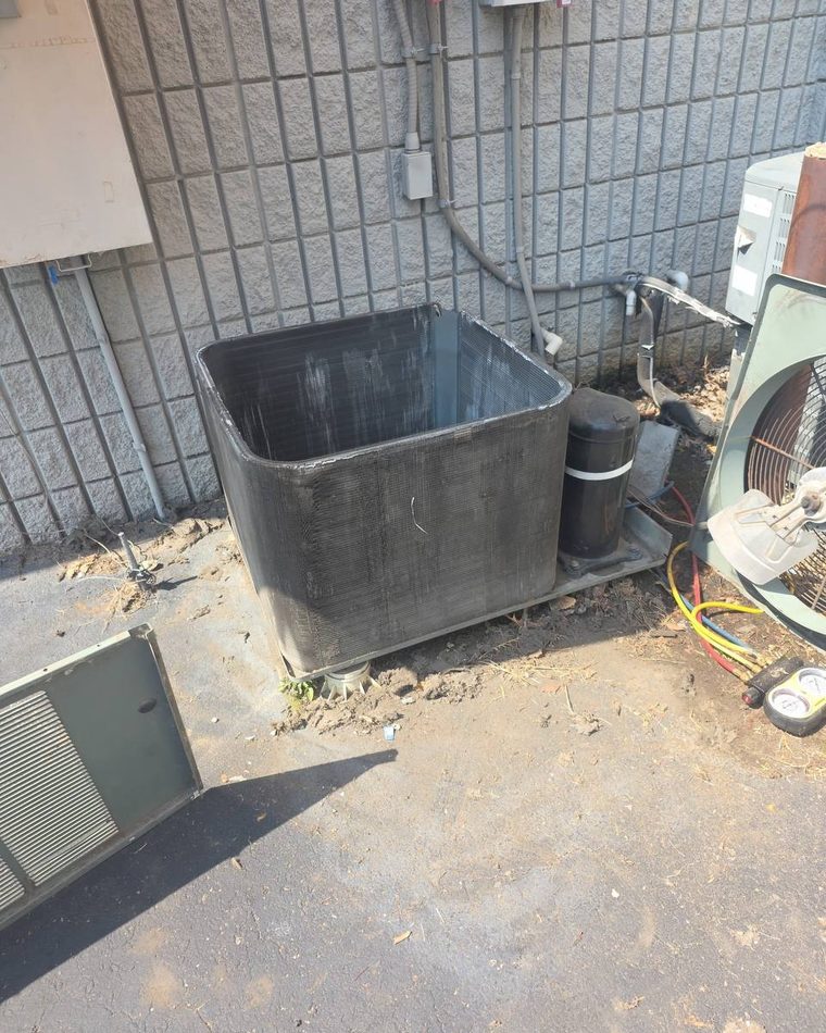 The same condenser coil after cleaning